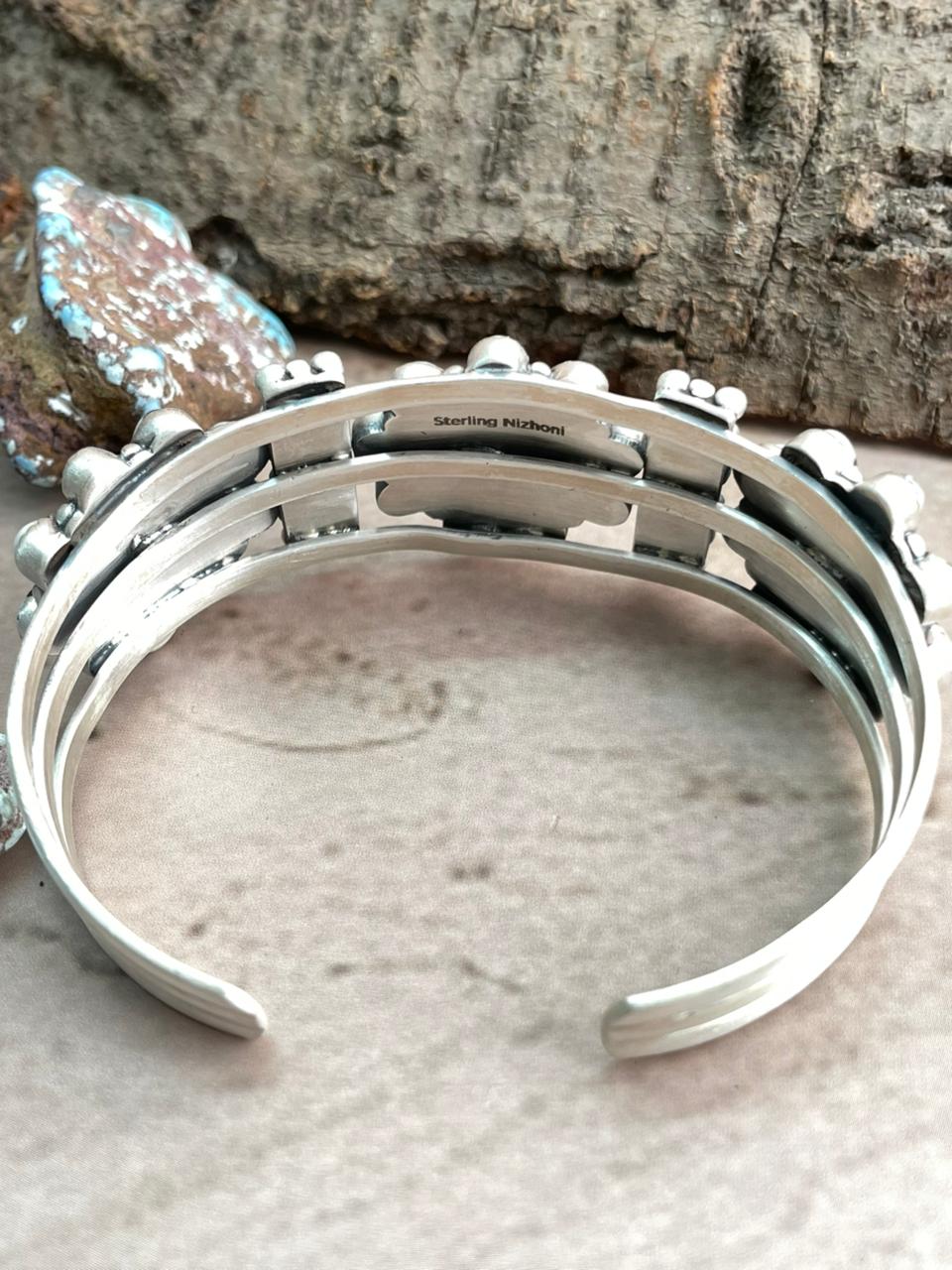 Handmade Sterling Silver White Buffalo Cuff Bracelet with Signed Nizhoni Nizhoni Traders LLC