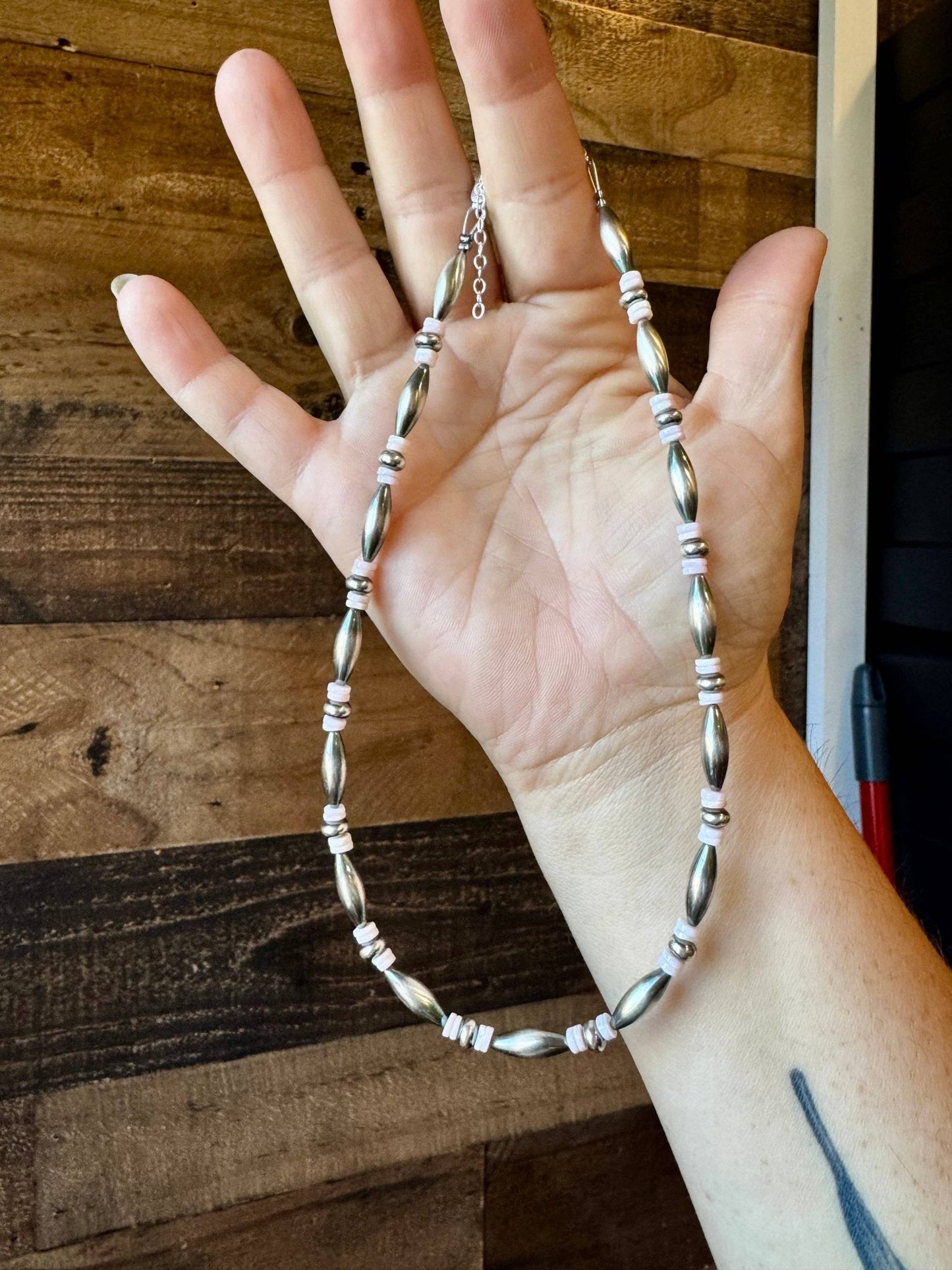 Torpedo choker Sterling Silver Pearls and pink conch Cowhide and Conchos