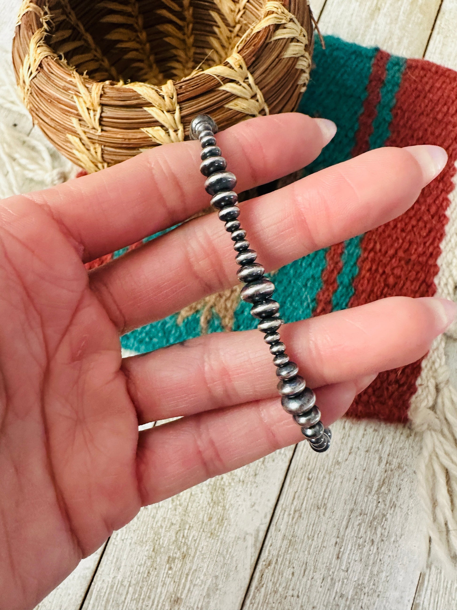 Handcrafted Sterling Silver Stretch Saucer Bead Bracelet Nizhoni Traders LLC