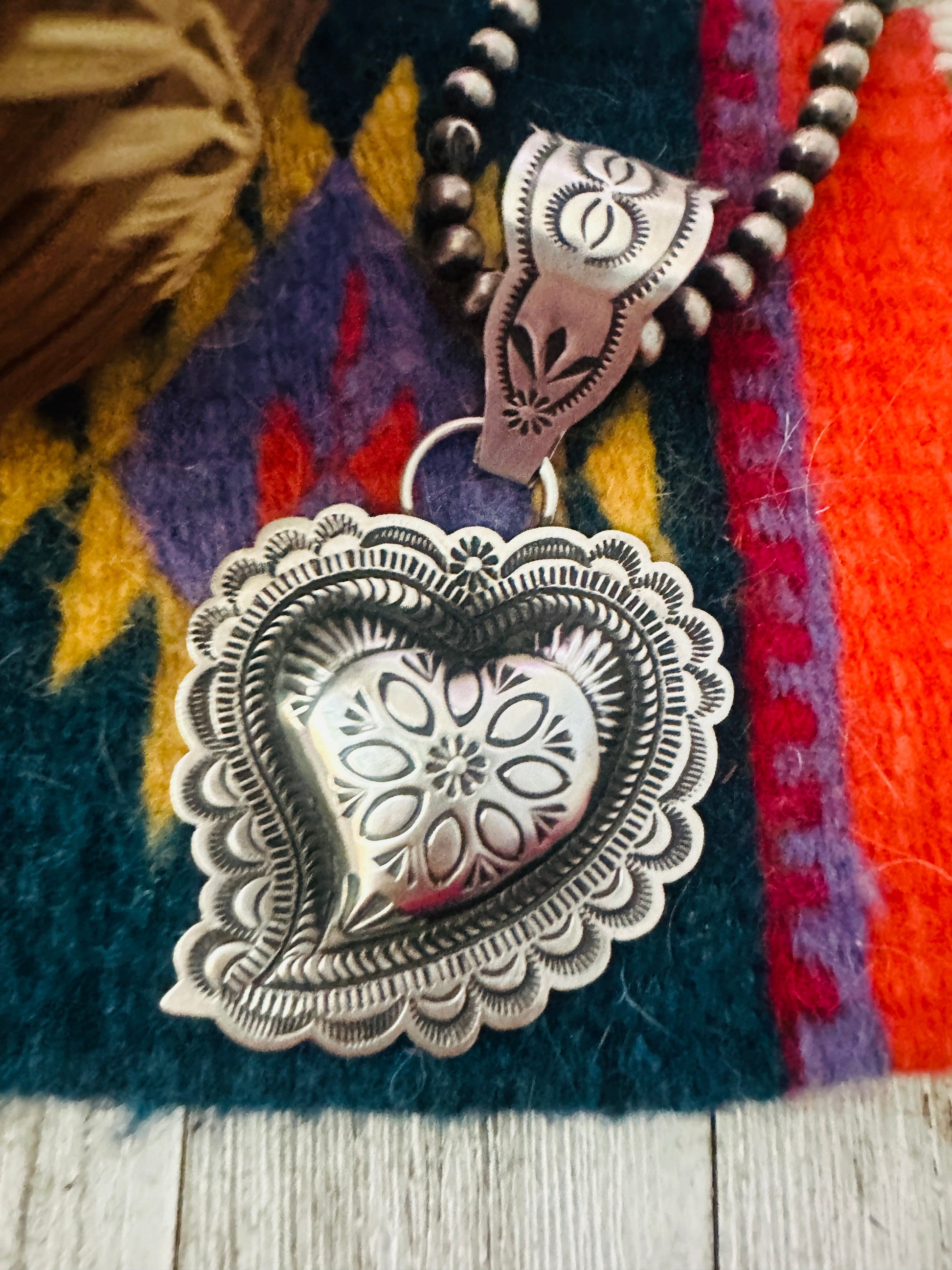 Handcrafted Sterling Silver Heart Concho Pendant by Leander Tahe Nizhoni Traders LLC