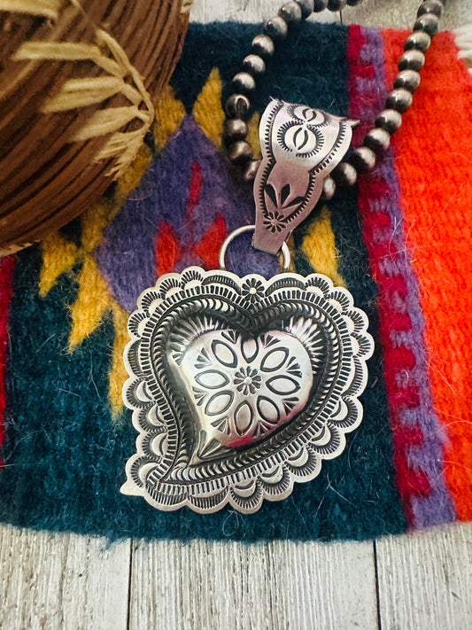Handcrafted Sterling Silver Heart Concho Pendant by Leander Tahe Nizhoni Traders LLC