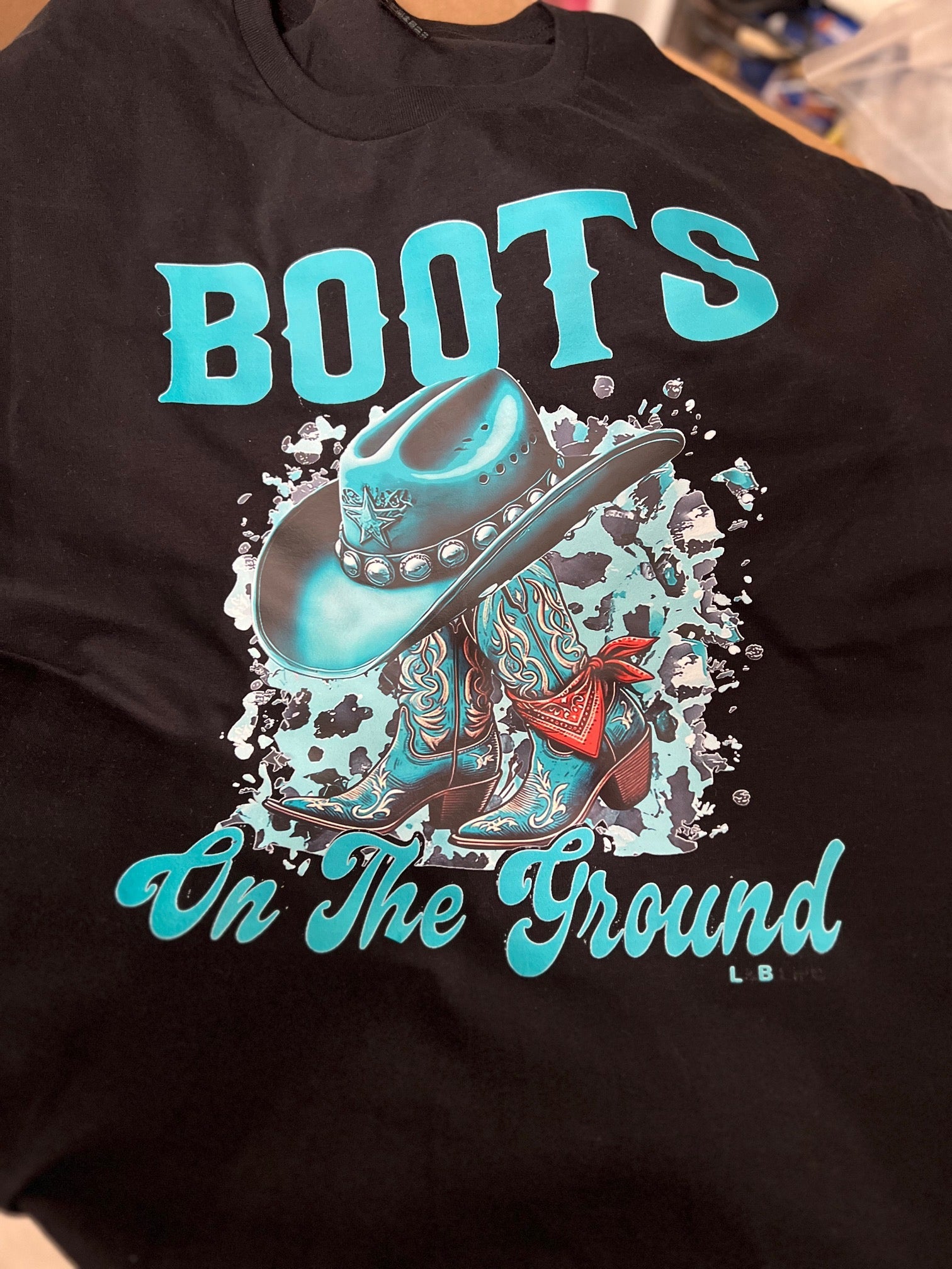 Western Themed Boots on the Ground Black TShirt Cedar Hill Country Market