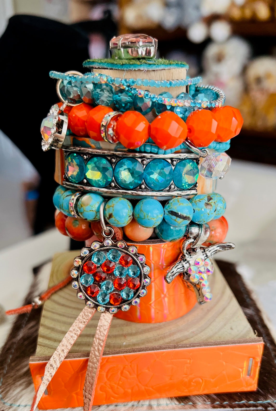 Sandra Ling 9 Piece Orange and Turquoise Longhorn Stretch Stack Bracelets Cedar Hill Country Market